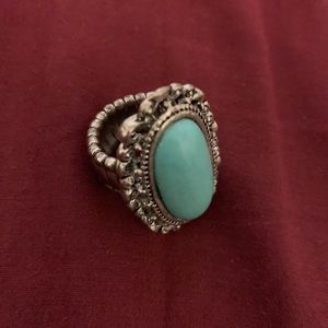 Woman’s ring, braclet, button